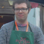 Edmund working in the potting shed at college