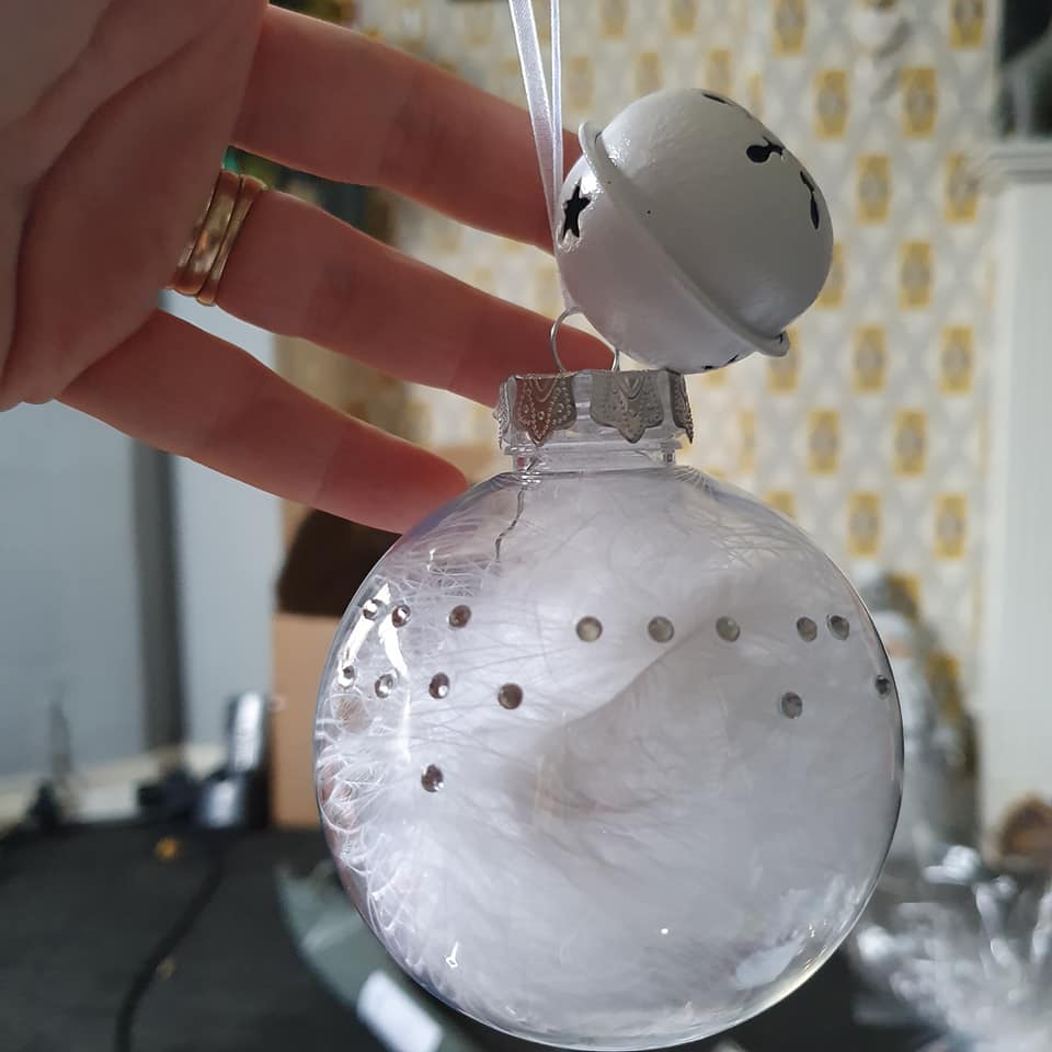 Christmas tree bauble with raised braille dots.
