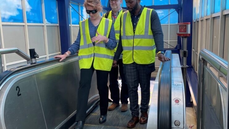 TfGM staff undertaking visual impairment awareness training on an escalator