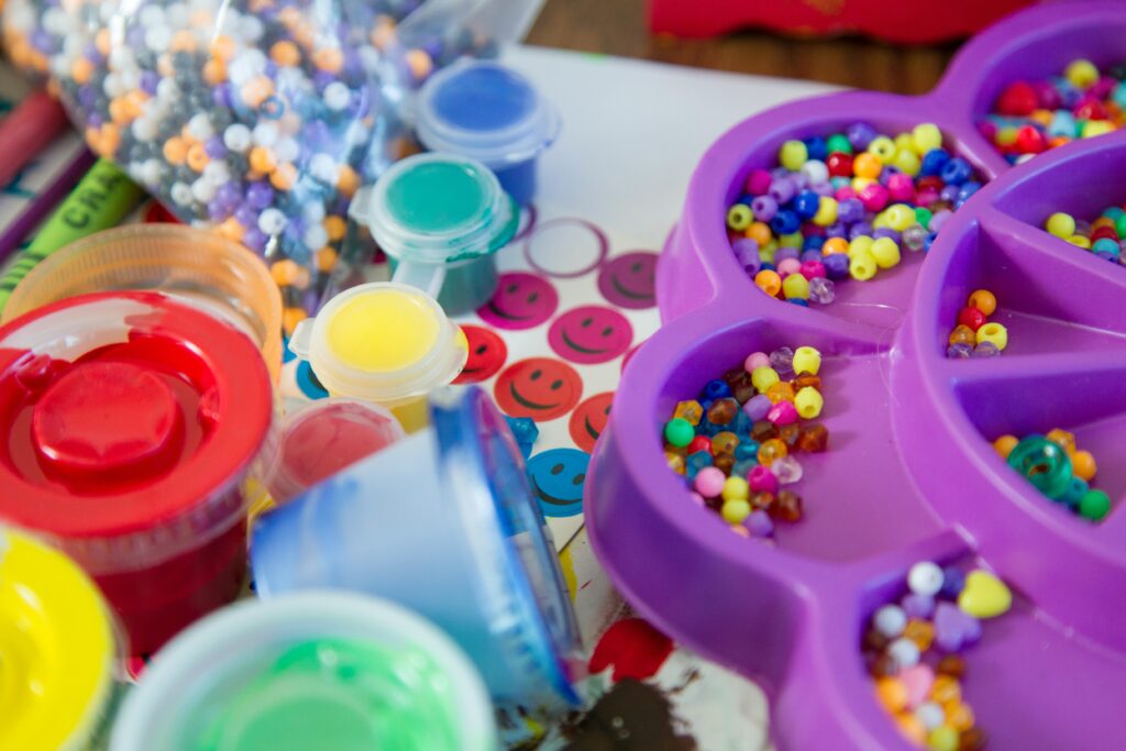 Craft materials including paint and beads
