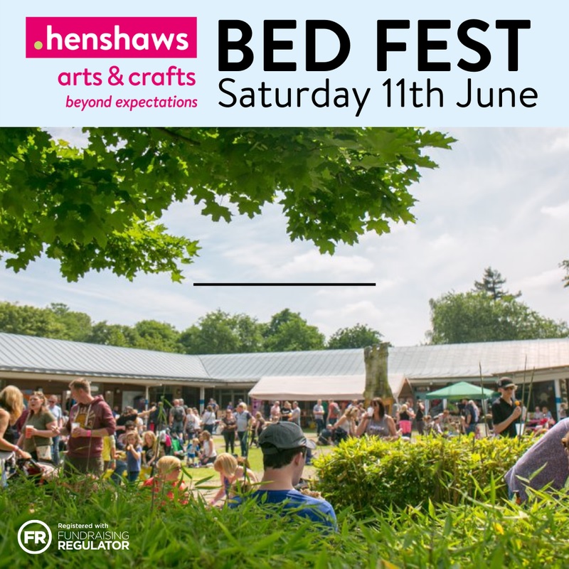 Image of people outside the arts and crafts centre in the sunshine. Text at the top reads 'Bed Fest Saturday 11th June' which is next to the Henshaws logo